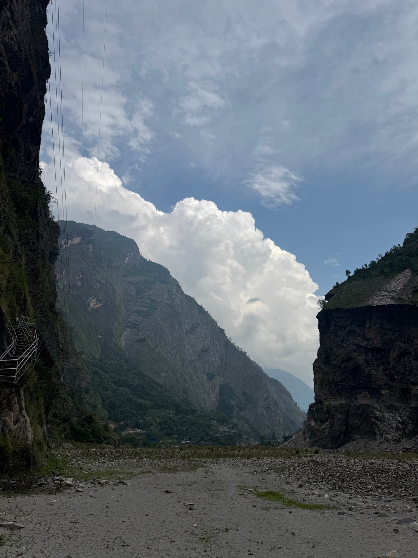 Clouds gathering above the rocky valley.
